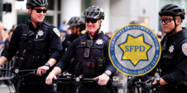Image of police officers on bicycle patrol wearing sunglasses